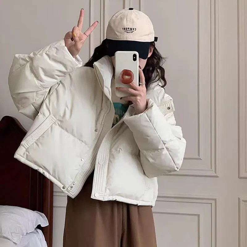 PU leather short white duck down jacket women's 2025 winter new fashion stand-up collar leave-in loose small coat