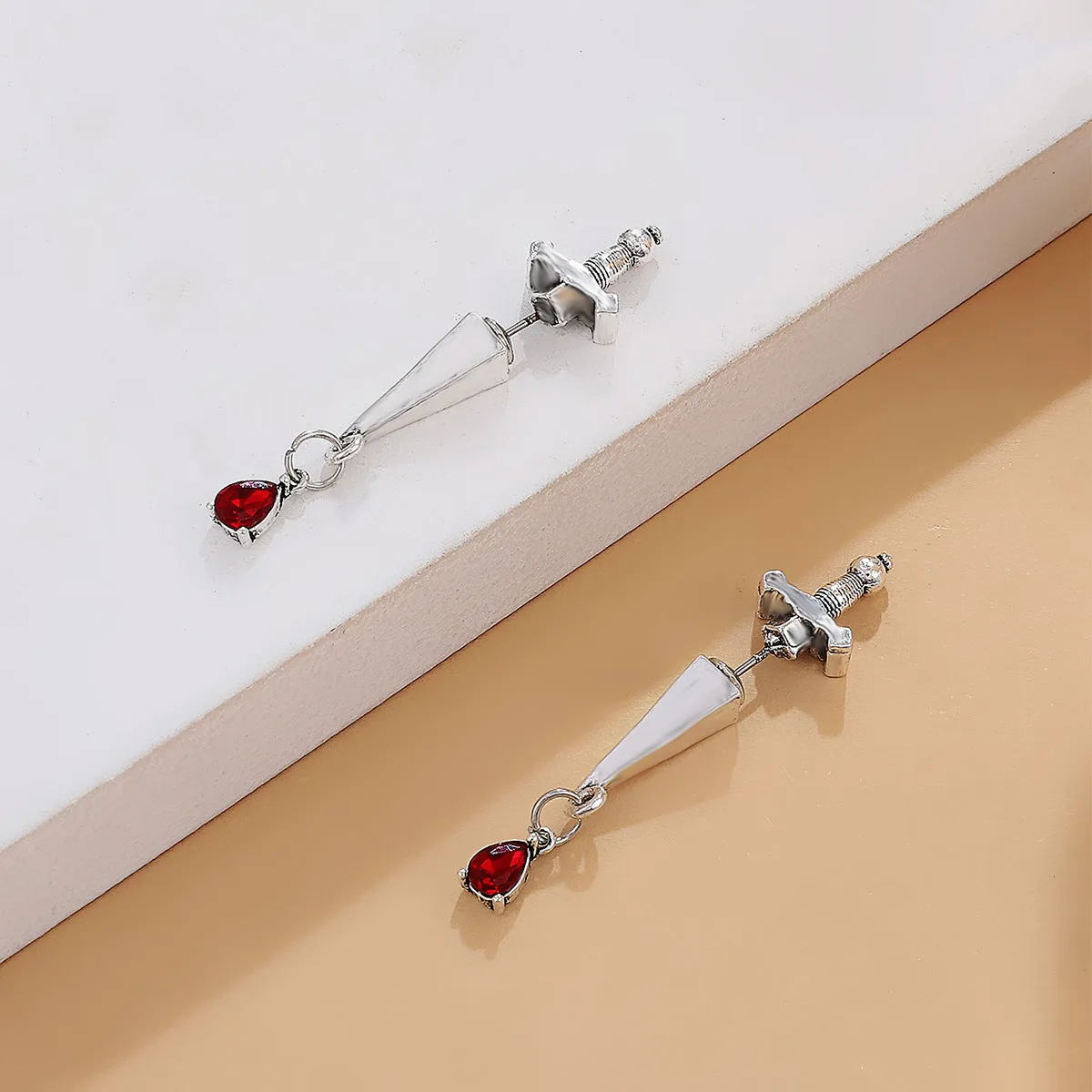 Red Crystal & Silver-Plated Sword Ear Jackets
